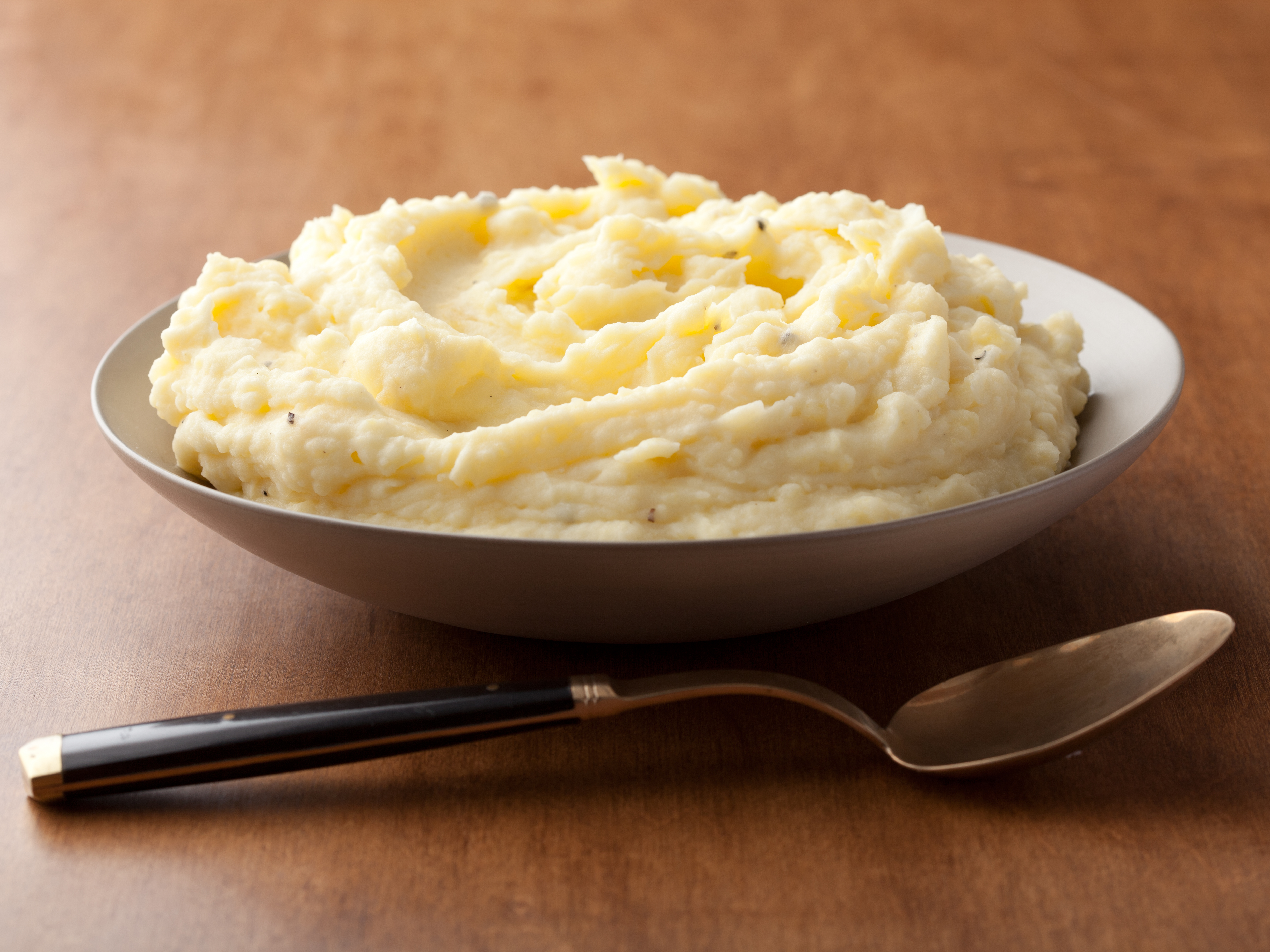 https://www.foodnetwork.com/content/dam/images/food/fullset/2011/8/10/1/Thanksgiving-2011_IG1C18-sour-cream-mashed-potatoes_s4x3.jpg