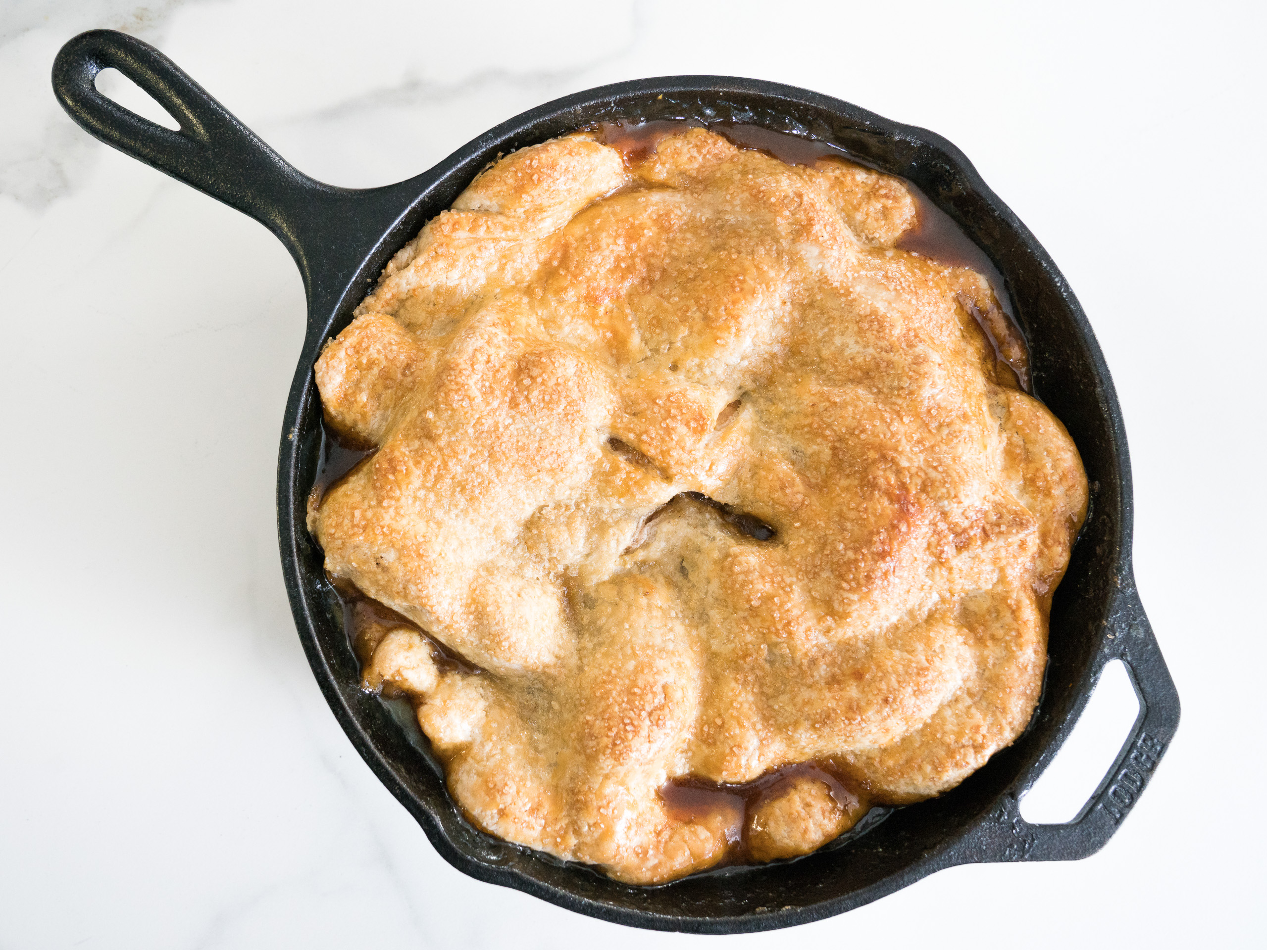 https://www.foodnetwork.com/content/dam/images/food/fullset/2017/12/28/0/YW1108_Peach-and-Brown-Butter-Skillet-Pie_s4x3.jpg