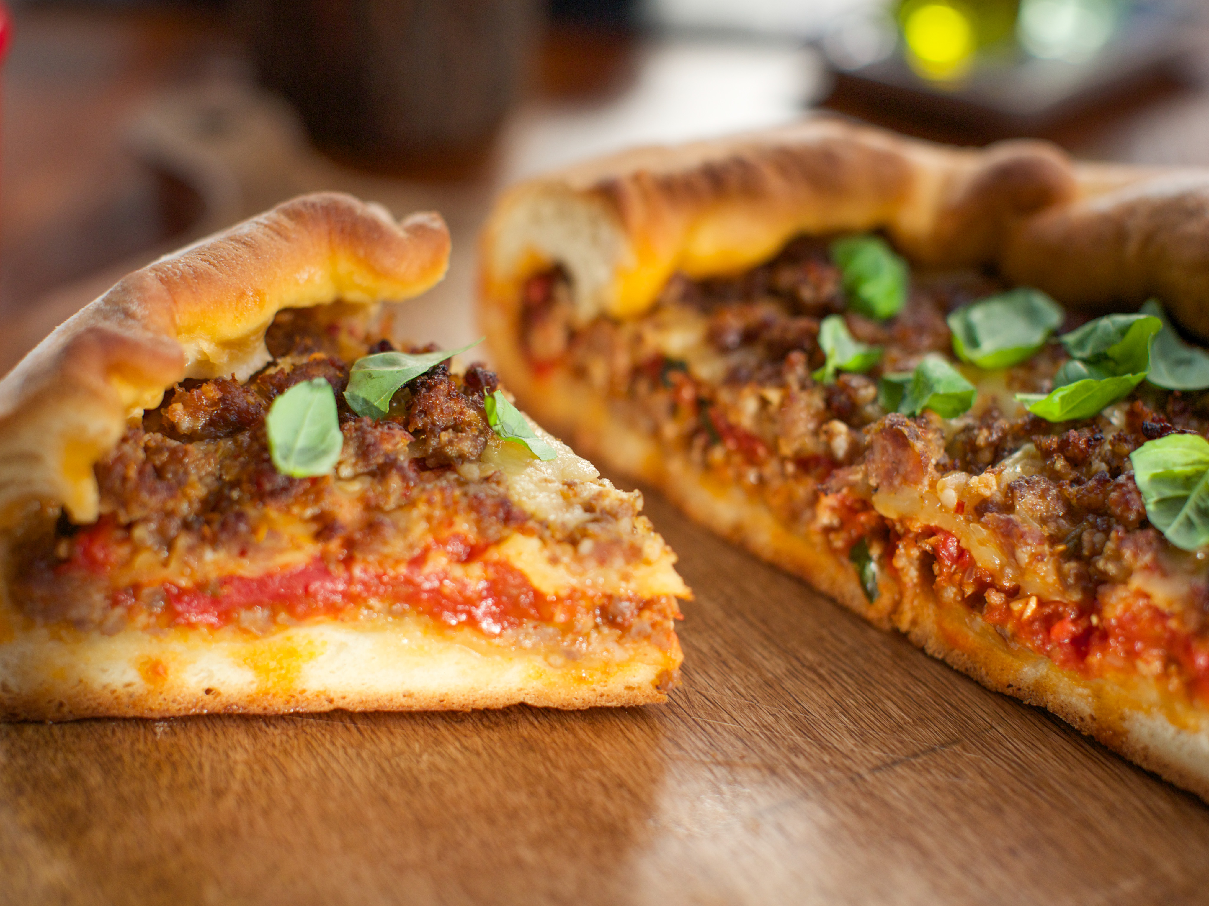 https://www.foodnetwork.com/content/dam/images/food/fullset/2017/2/27/1/VB0503H_Deep-Dish-Sausage-Pizza_s4x3.jpg