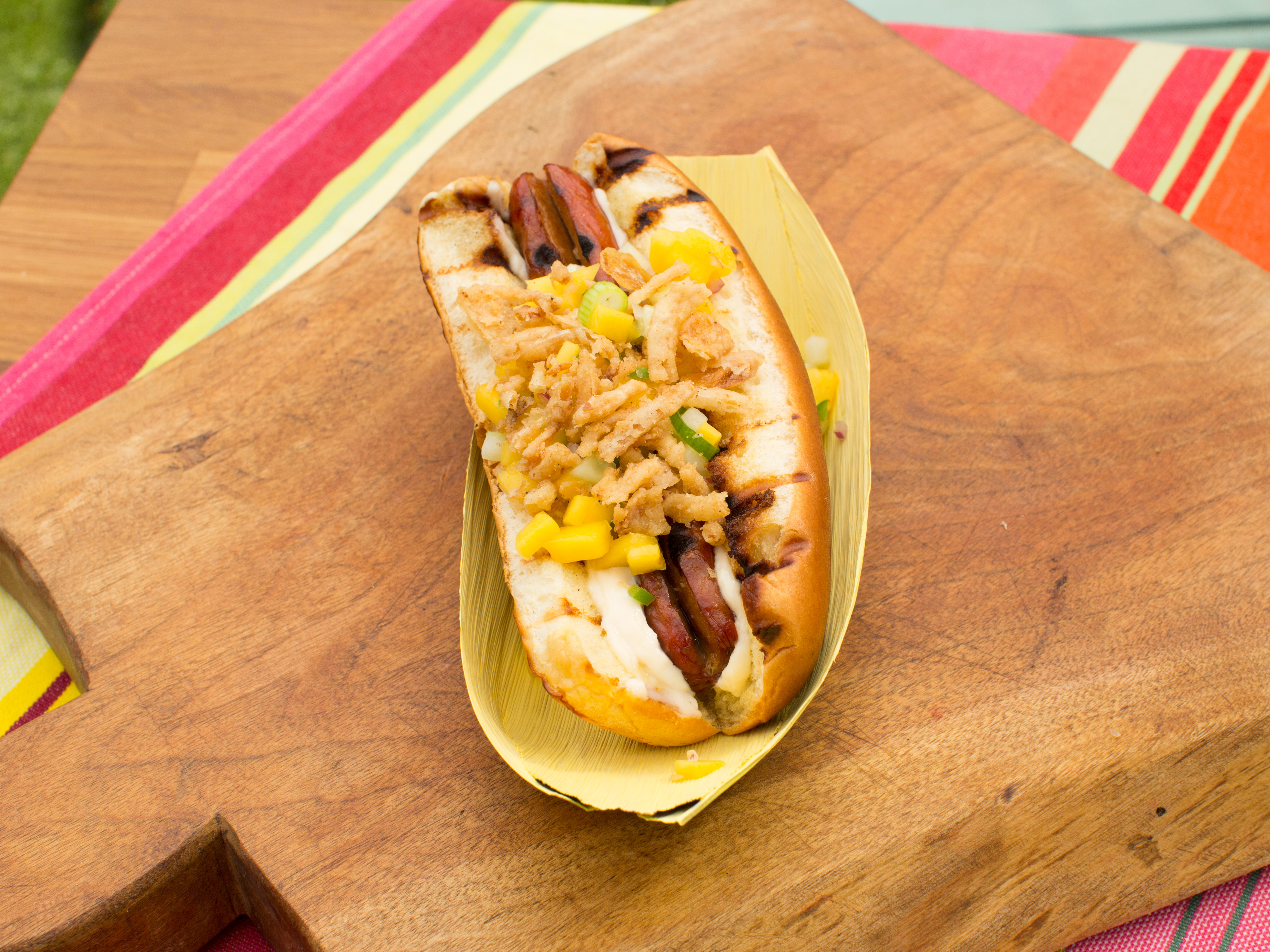 https://www.foodnetwork.com/content/dam/images/food/fullset/2017/8/8/0/KC1405H_Spicy-Mango-Hot-Dog-2_s4x3.jpg