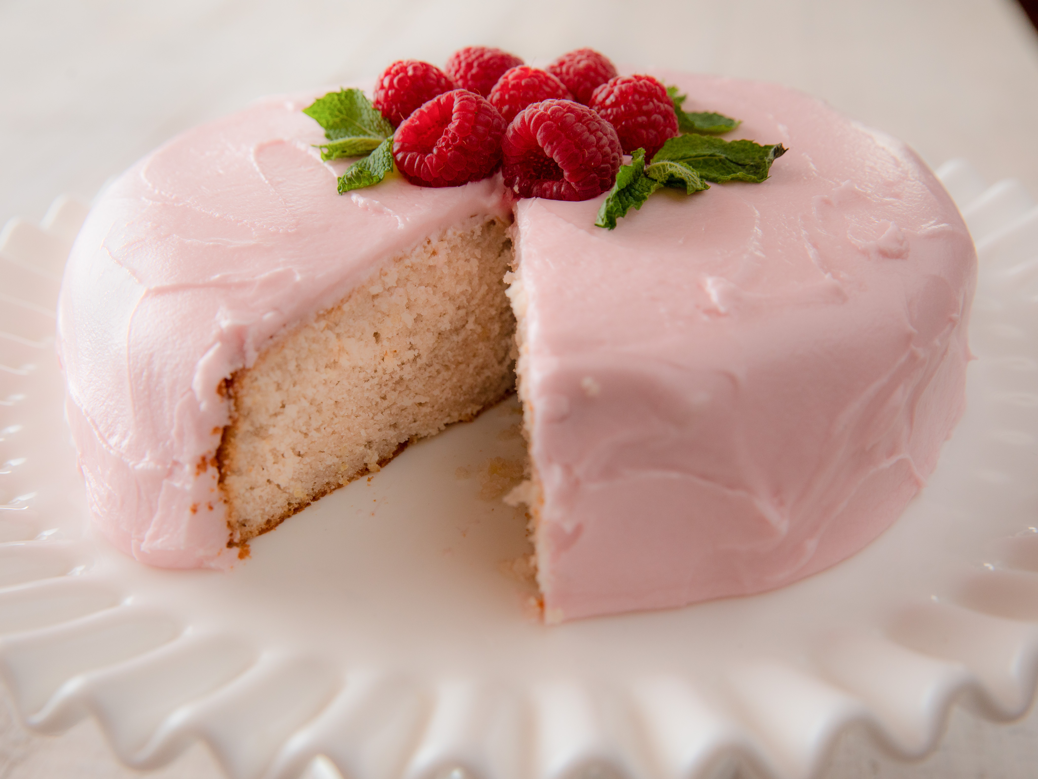 https://www.foodnetwork.com/content/dam/images/food/fullset/2019/1/29/0/WU2108_Lemon-and-Raspberry-Cream-Cake_s4x3.jpg