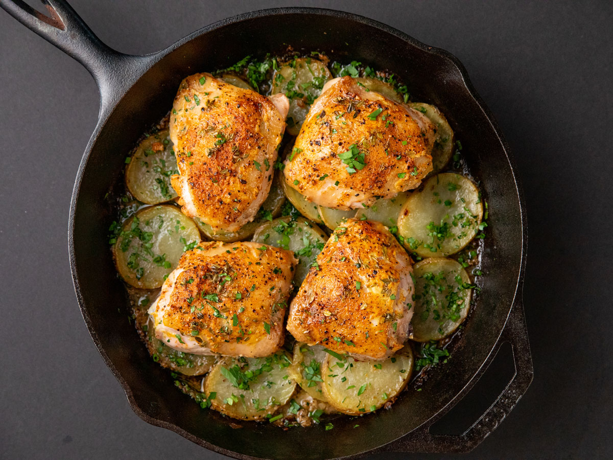 https://www.foodnetwork.com/content/dam/images/food/fullset/2021/10/26/BX1901__Skillet-Roasted-Chickenand-Potatoes_s4x3.jpg